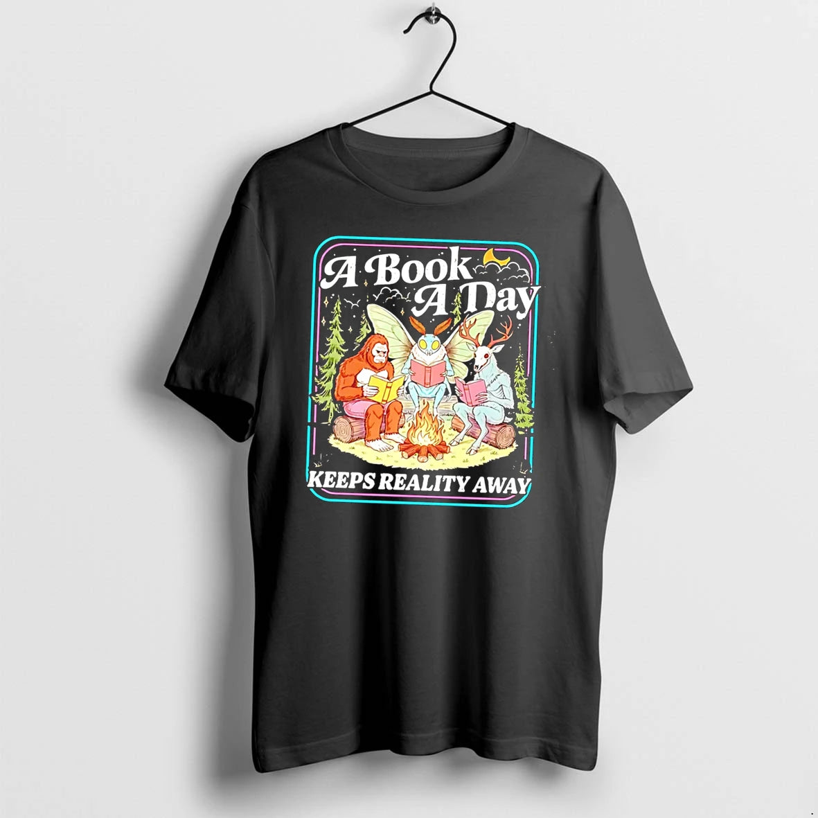Officials A Book A Day Keeps Reality Away Cryptid Reading Club Tee