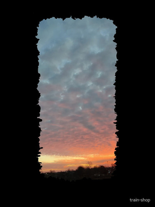 a beautiful sunset by train-shop