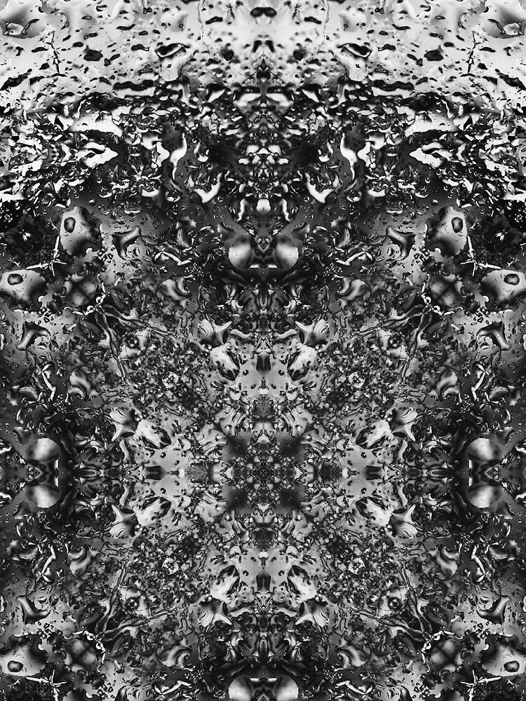 Symmetry with water drops in black and white by Psilographics